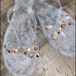 Jelly flip flops with gold studs